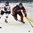 POPRAD, SLOVAKIA - APRIL 17: Switzerland's Nico Hischier #13 stick checks Canada's Joshua Brook #2 during preliminary round action at the 2017 IIHF Ice Hockey U18 World Championship. (Photo by Andrea Cardin/HHOF-IIHF Images)